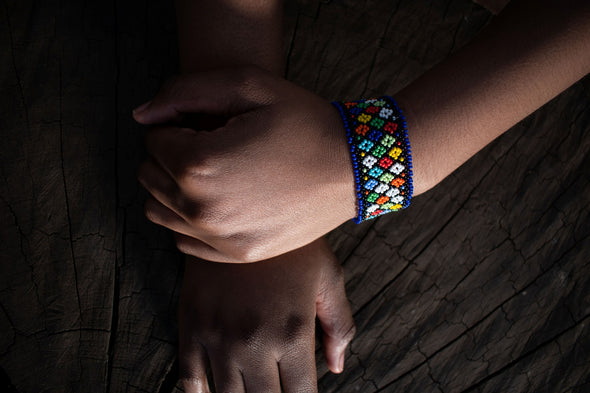 Lady wearing an African beaded bracelet